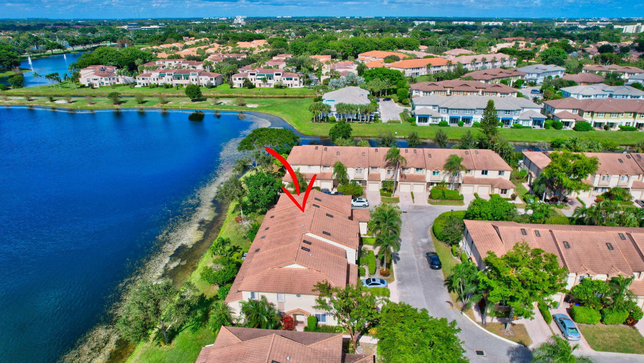 6795 Via Regina Boca Raton, FL 33433 - Photo 55 of 83 an aerial view of a house with a garden and lake view