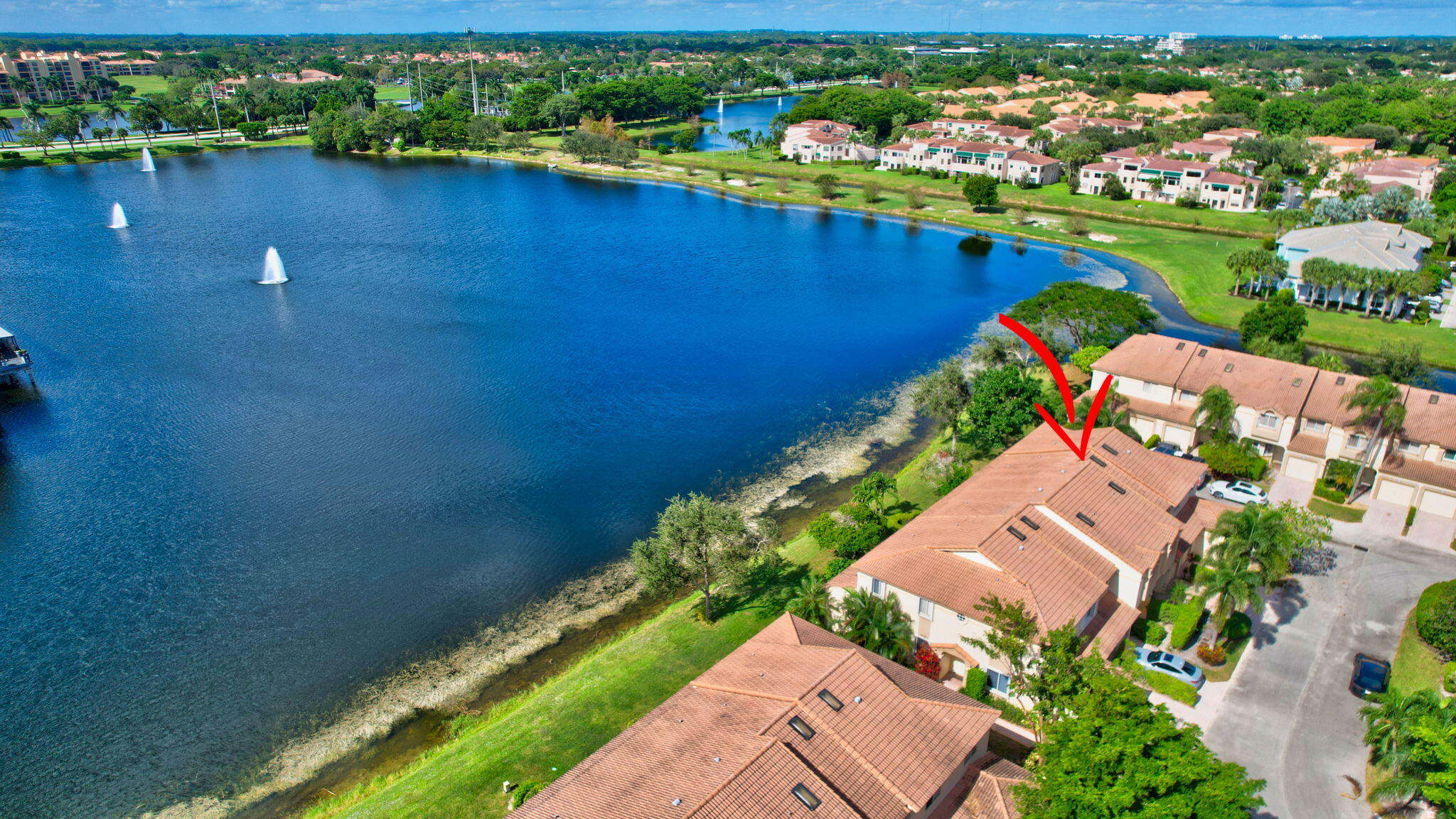 6795 Via Regina Boca Raton, FL 33433 - Photo 56 of 83 an aerial view of a house with a lake view