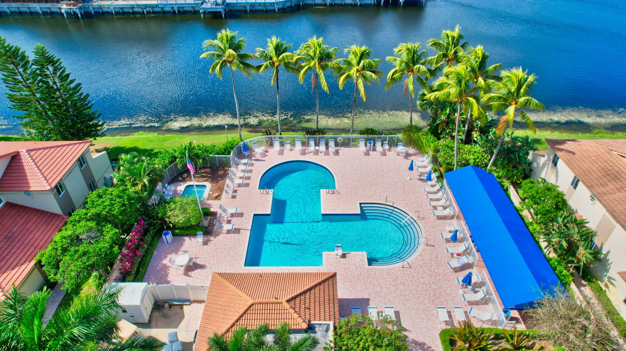6795 Via Regina Boca Raton, FL 33433 - Photo 61 of 83 an aerial view of a house with a garden and plants