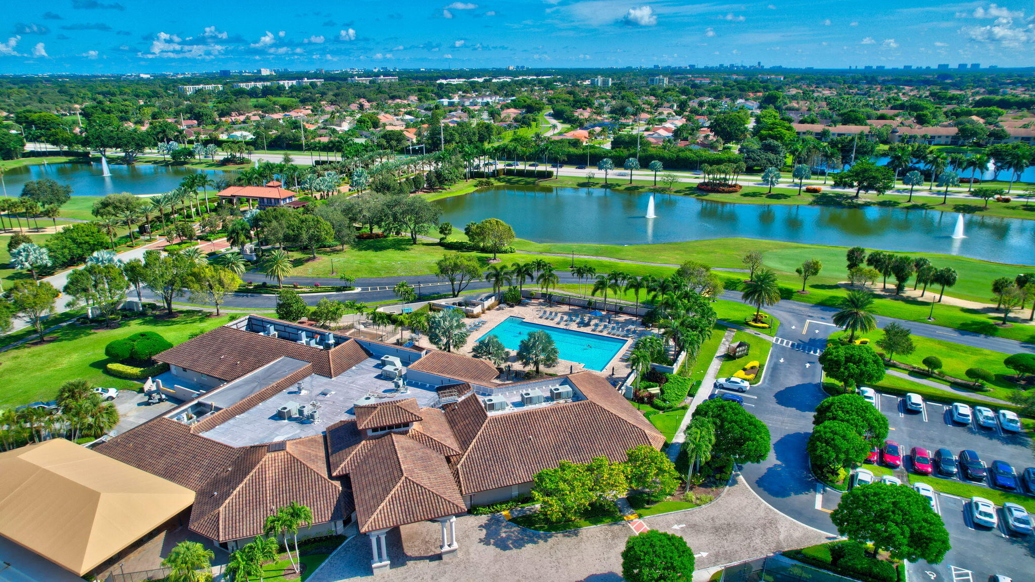 6795 Via Regina Boca Raton, FL 33433 - Photo 82 of 83 an aerial view of a houses with a lake view and a mountain
