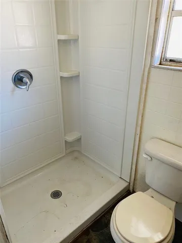 a bathroom with a sink and toilet