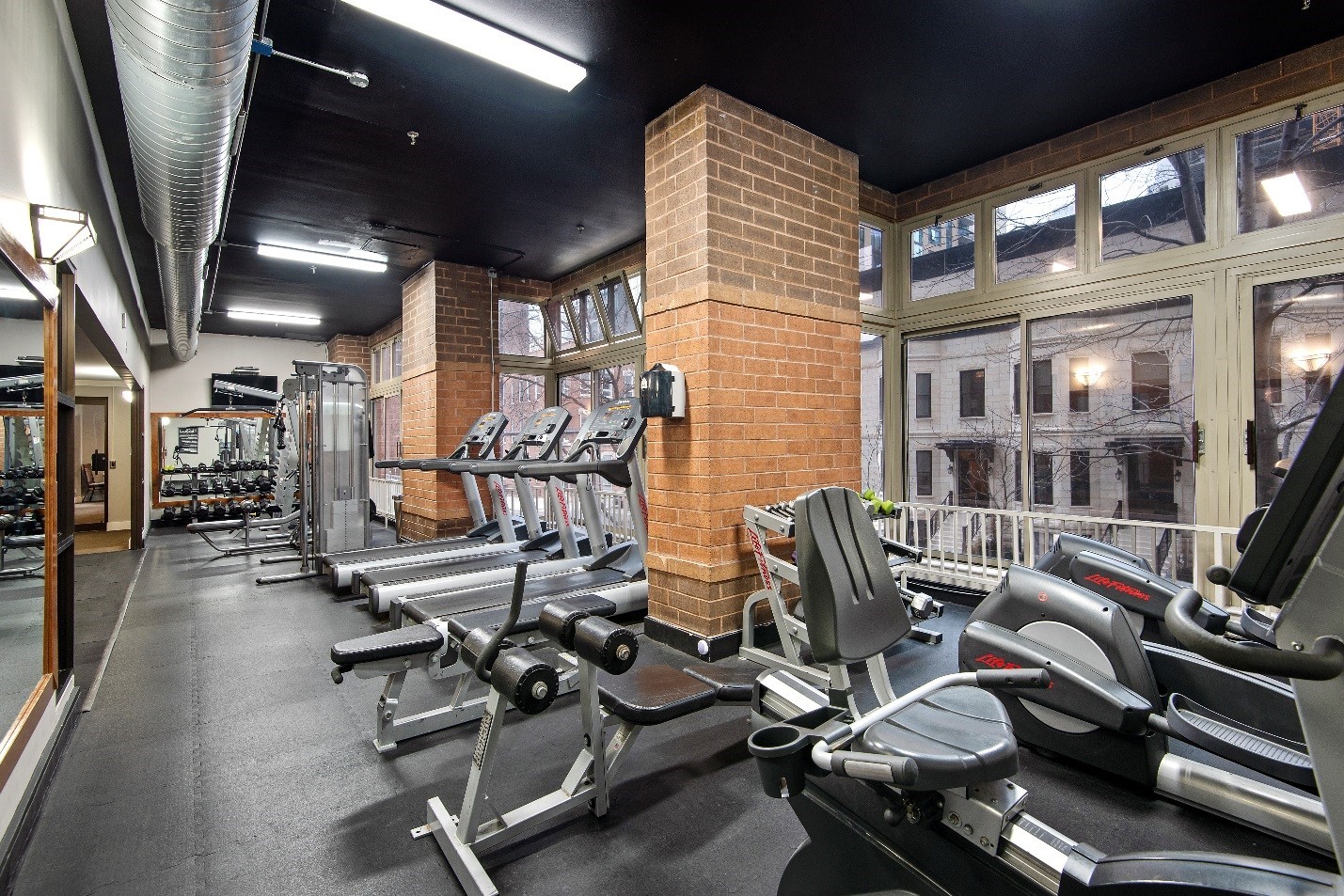 100 West Chestnut Street, Unit 2505 Chicago, IL 60610 - Photo 3 of 13 a view of a room with gym equipment