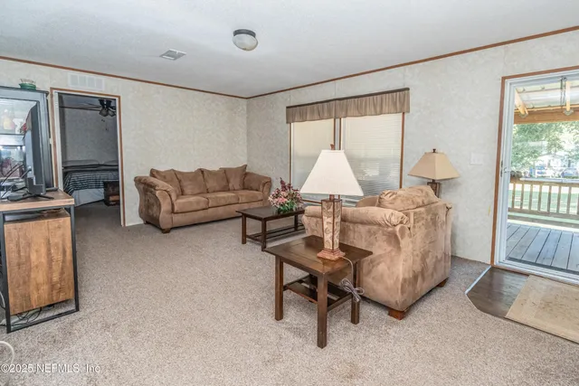 a view of a dining room with furniture