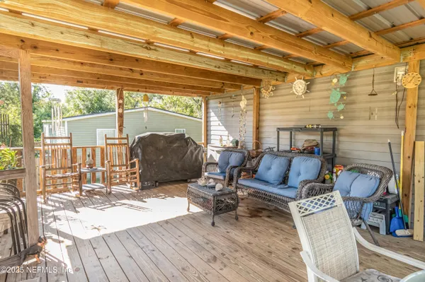 a porch with view of outdoor space