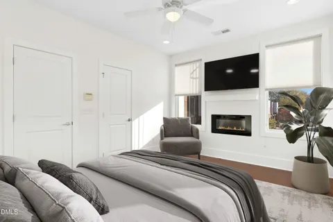 a kitchen with a sink a counter space and cabinets