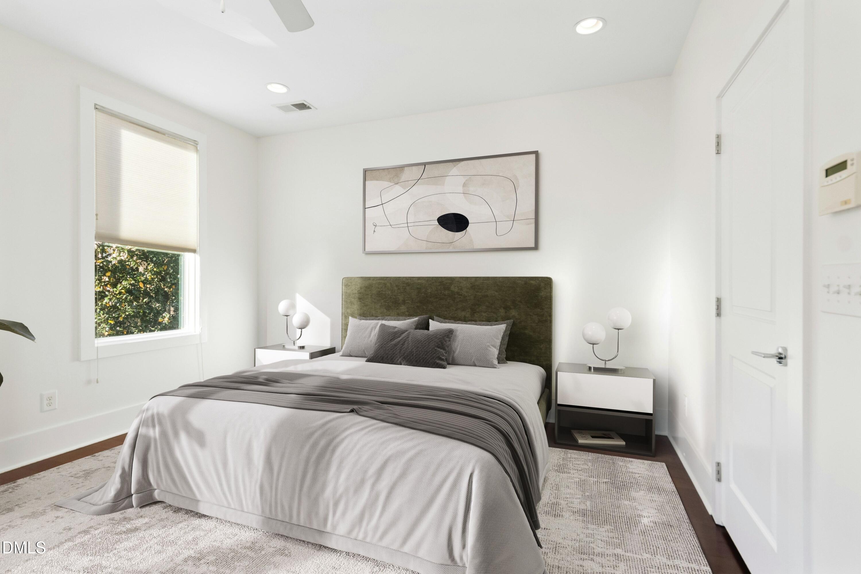 226 William Drummond Way Raleigh, NC 27604 - Photo 19 of 34 a bedroom with a bed and a window