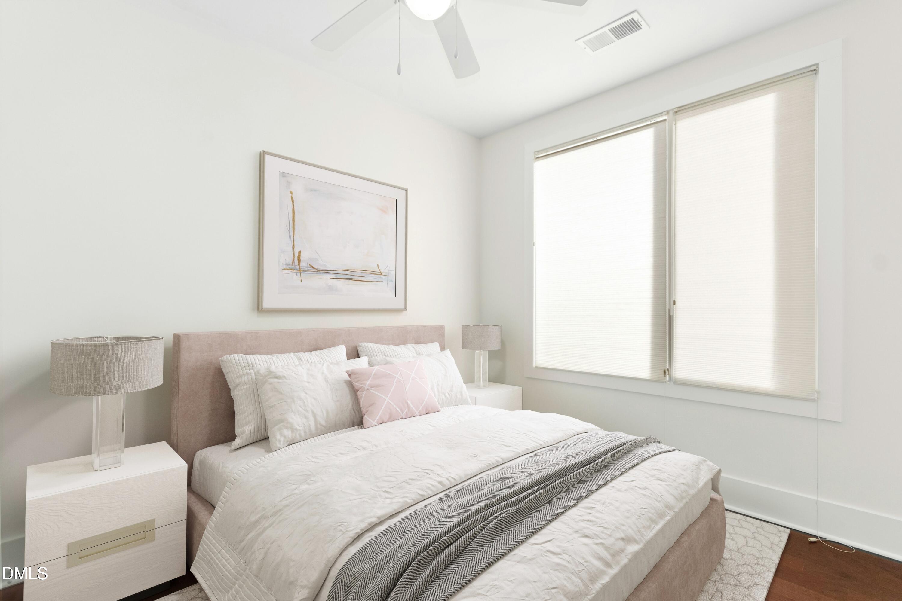 226 William Drummond Way Raleigh, NC 27604 - Photo 21 of 34 a bedroom with a bed and a couch