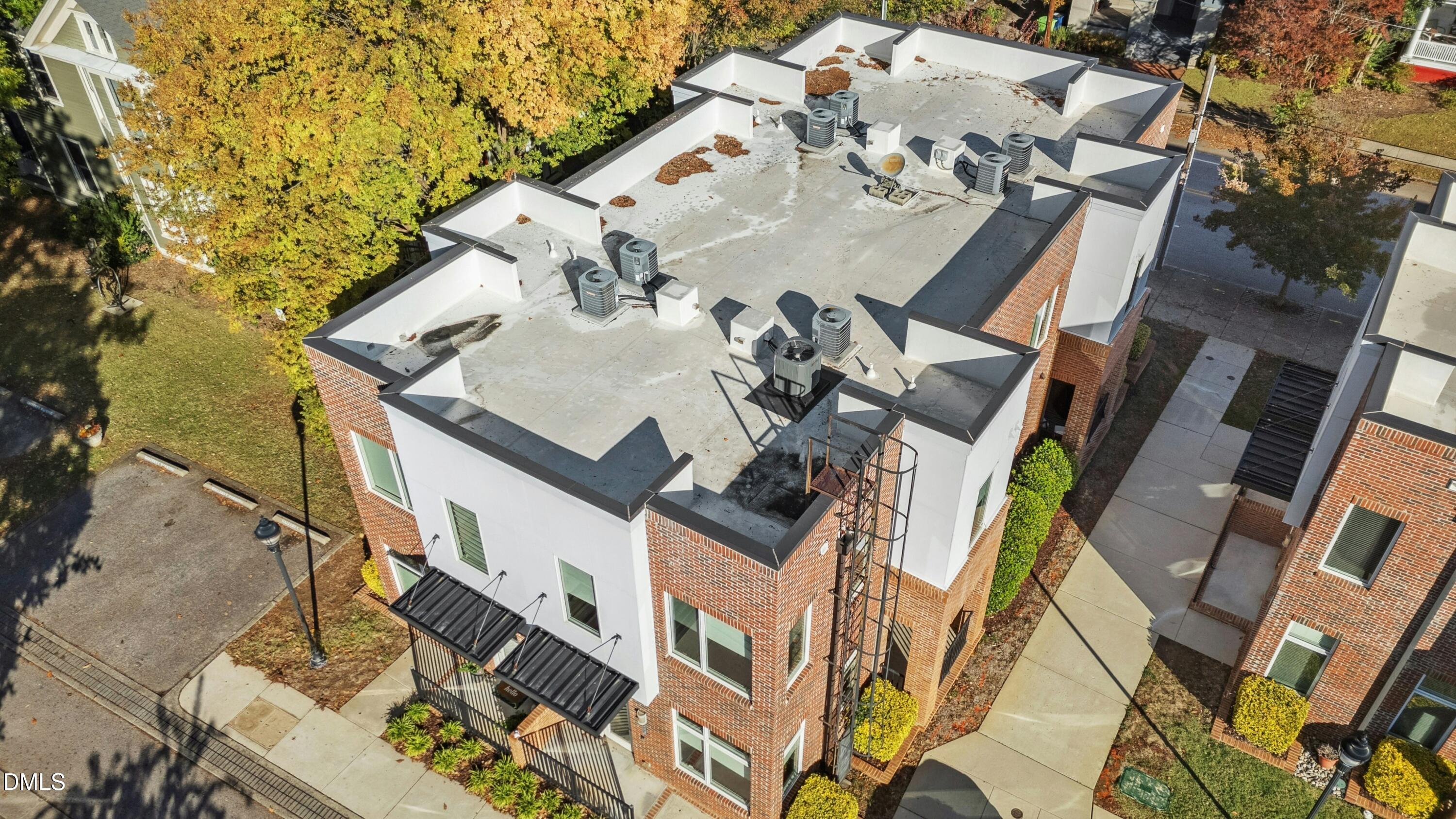 226 William Drummond Way Raleigh, NC 27604 - Photo 30 of 34 an aerial view of a residential apartment building with a yard