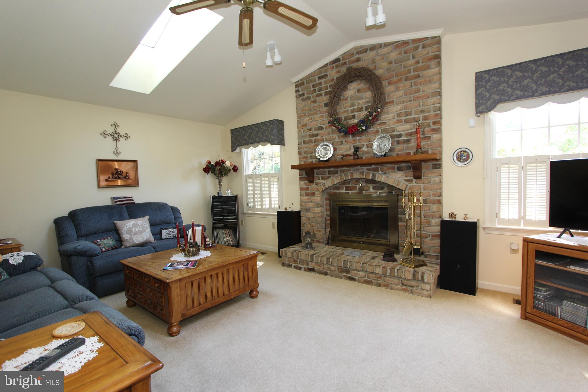 7133 Poole Jones Road Frederick, MD 21702 - Photo 11 of 67 Family room with vaulted ceiling & brick fireplace
