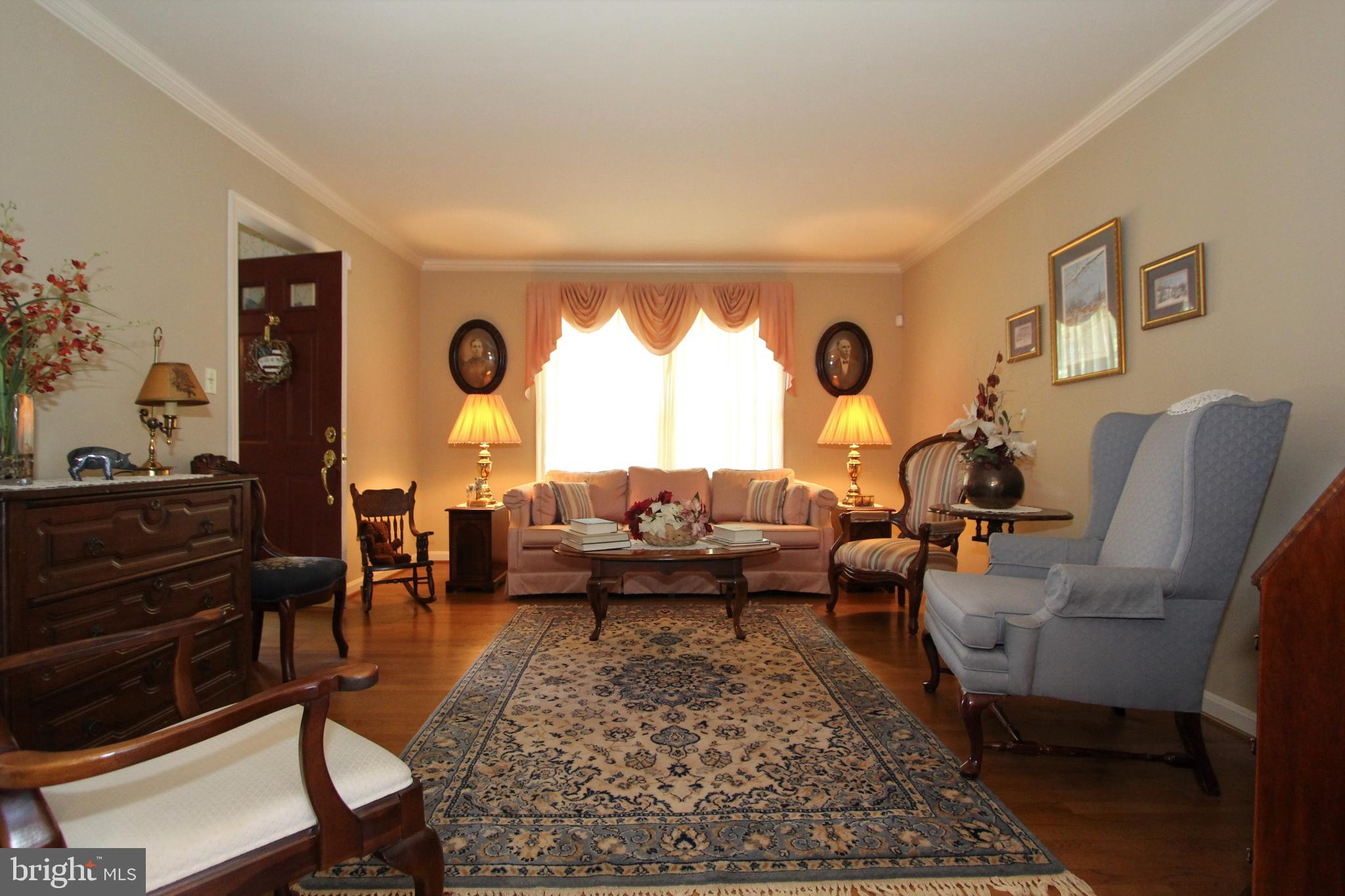7133 Poole Jones Road Frederick, MD 21702 - Photo 13 of 67 Living room with gleaming hardwood floors