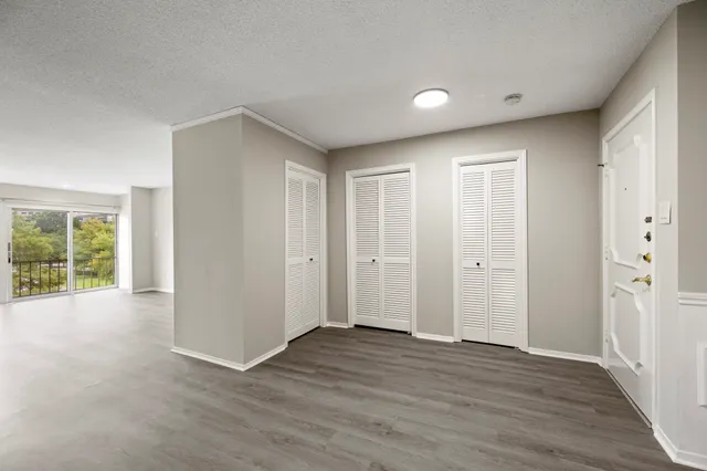 a view of a backyard with sitting area