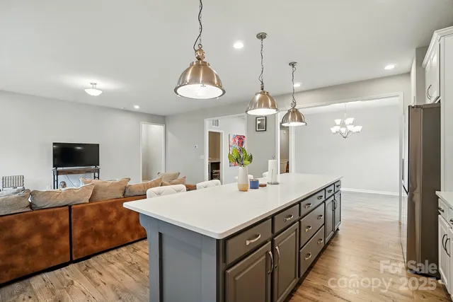 a view of living room kitchen and microwave