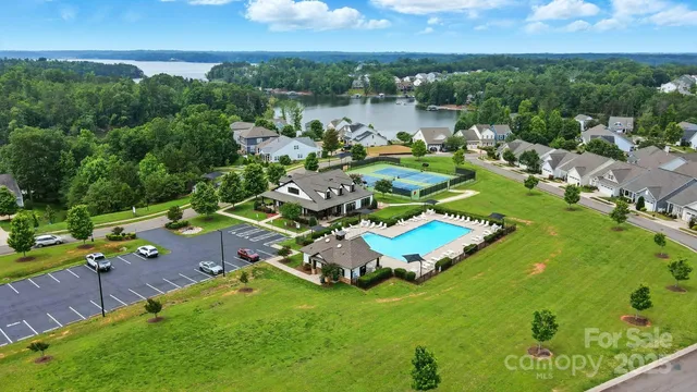 a view of a wooden deck with a trees
