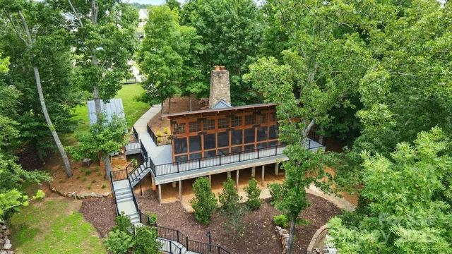 a view of a house with a tree