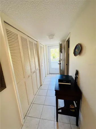a view of a livingroom with furniture and wooden floor