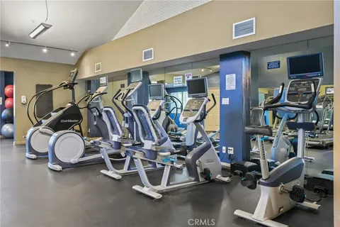 a street view with tall buildings and a street sign