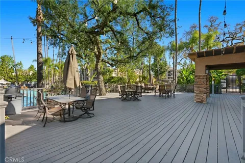 an aerial view of a house with a yard and garden