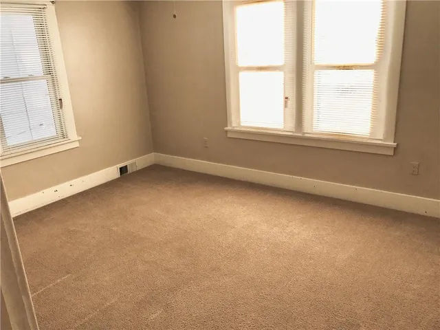 an empty room with a window