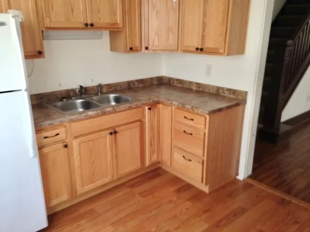 a kitchen with a stove and a microwave