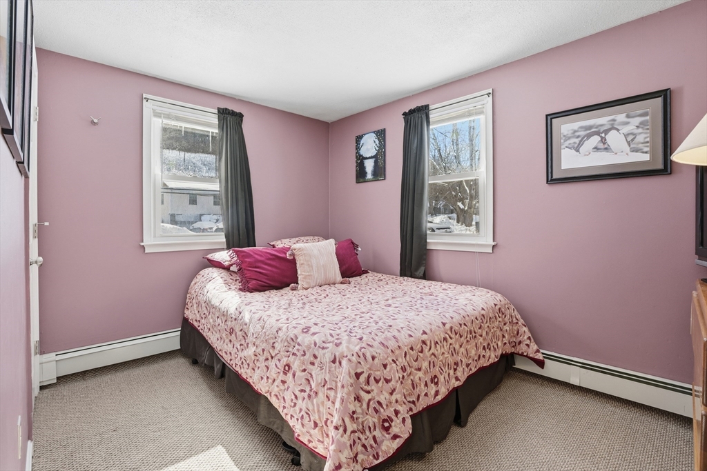 153 Summer Street Maynard, MA 01754 - Photo 19 of 26 a bedroom with a bed and a window