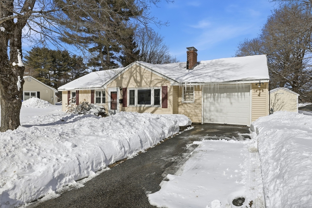 153 Summer Street Maynard, MA 01754 - Photo 2 of 26 a front view of a house with a yard