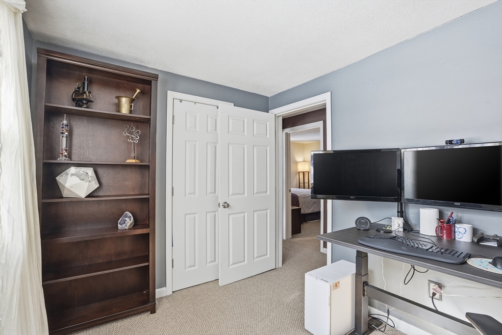 153 Summer Street Maynard, MA 01754 - Photo 23 of 26 a kitchen with a appliances cabinets and furniture