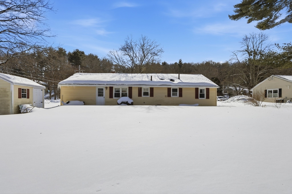 153 Summer Street Maynard, MA 01754 - Photo 24 of 26 a view of house with outdoor space and sitting area