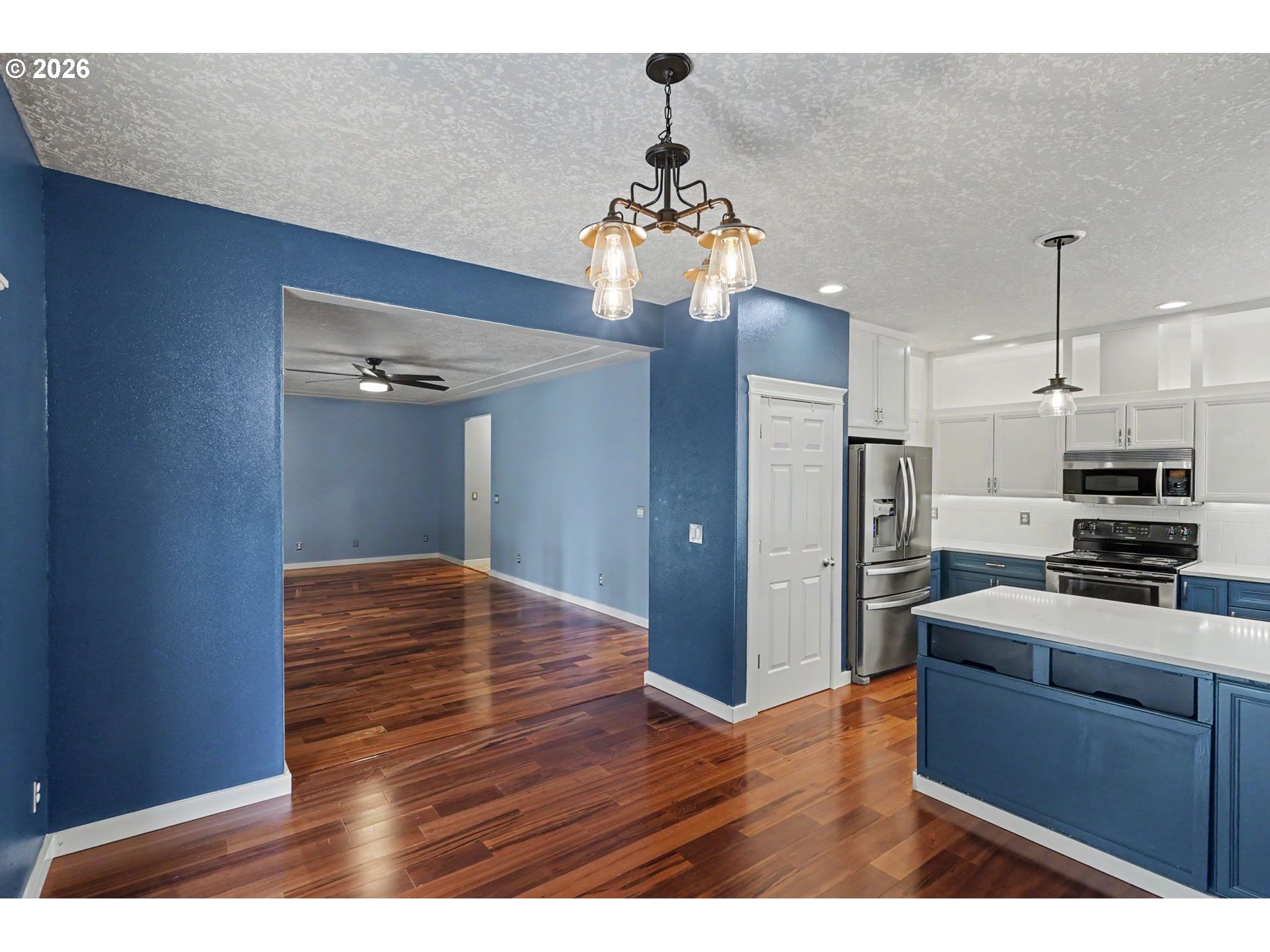 1462 Barnick Road Northeast Keizer, OR 97303 - Photo 17 of 48 a kitchen with stainless steel appliances a refrigerator and a stove top oven
