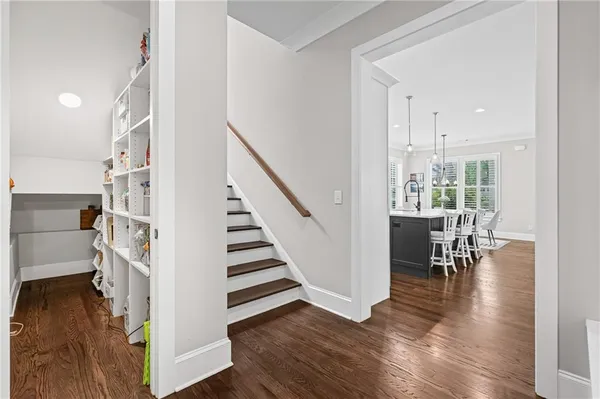 a view of dining room with furniture and wooden floor