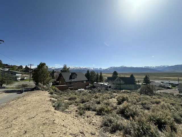 a view of a parking space and car parked
