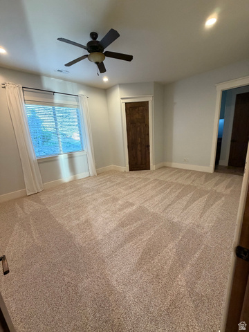 4536 North 475 East Provo, UT 84604 - Photo 36 of 65 Spacious room featuring neutral carpeting, a dark wood-finish ceiling fan, recessed lighting, and a window with blinds and white drapes