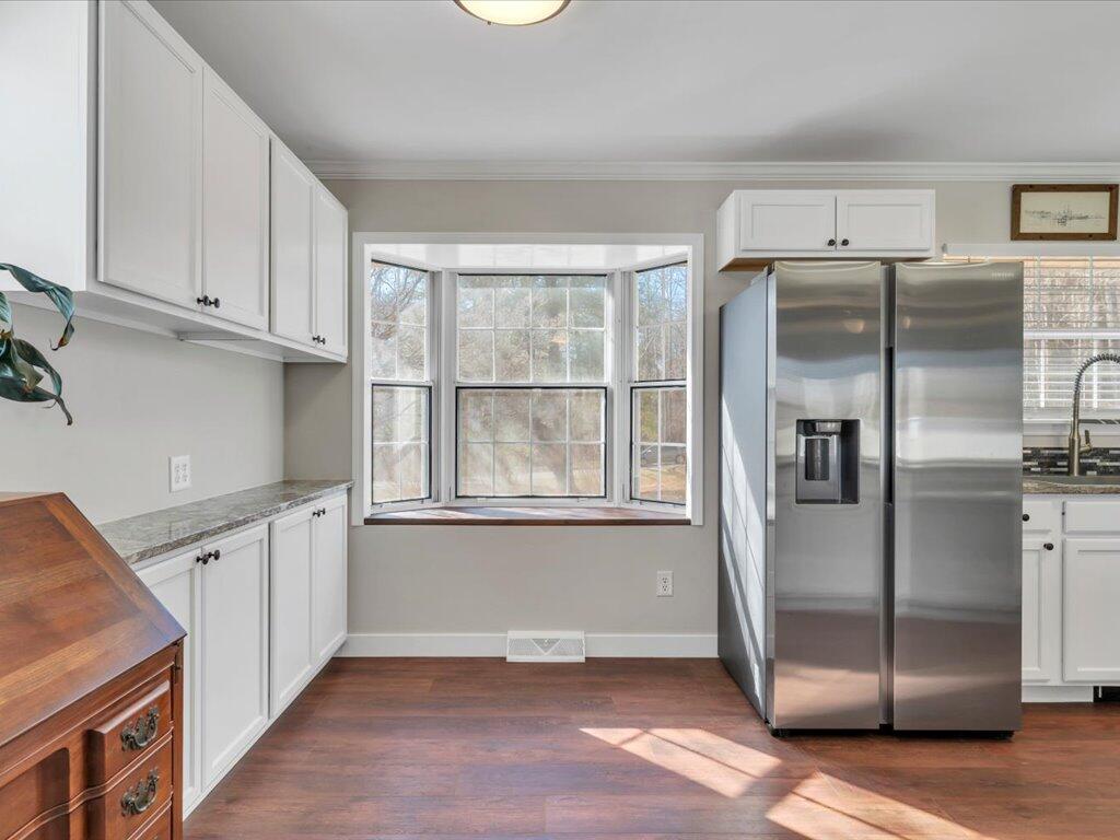 1511 Eggleston Falls Road Ridgeway, VA 24148 - Photo 11 of 151 a kitchen with stainless steel appliances granite countertop a refrigerator and a sink