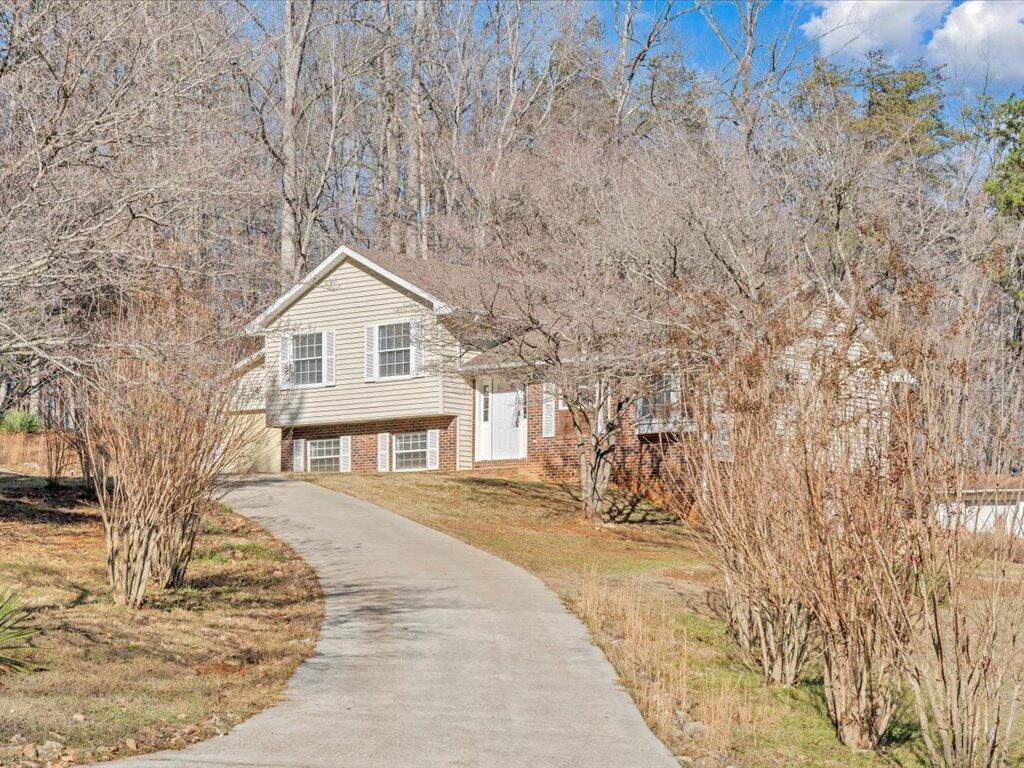 1511 Eggleston Falls Road Ridgeway, VA 24148 - Photo 150 of 151 a front view of a house with a yard