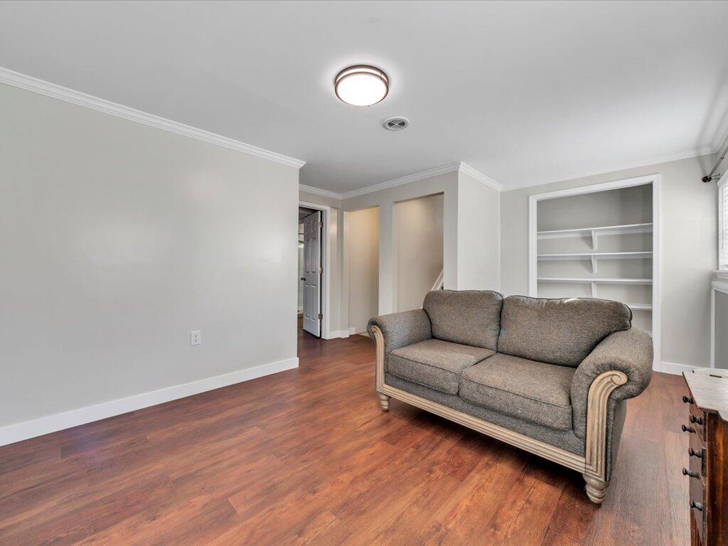 1511 Eggleston Falls Road Ridgeway, VA 24148 - Photo 42 of 151 a living room with furniture and a wooden floor
