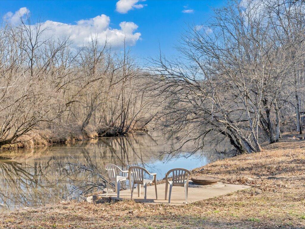 1511 Eggleston Falls Road Ridgeway, VA 24148 - Photo 70 of 151 a view of a yard covered with snow in the background