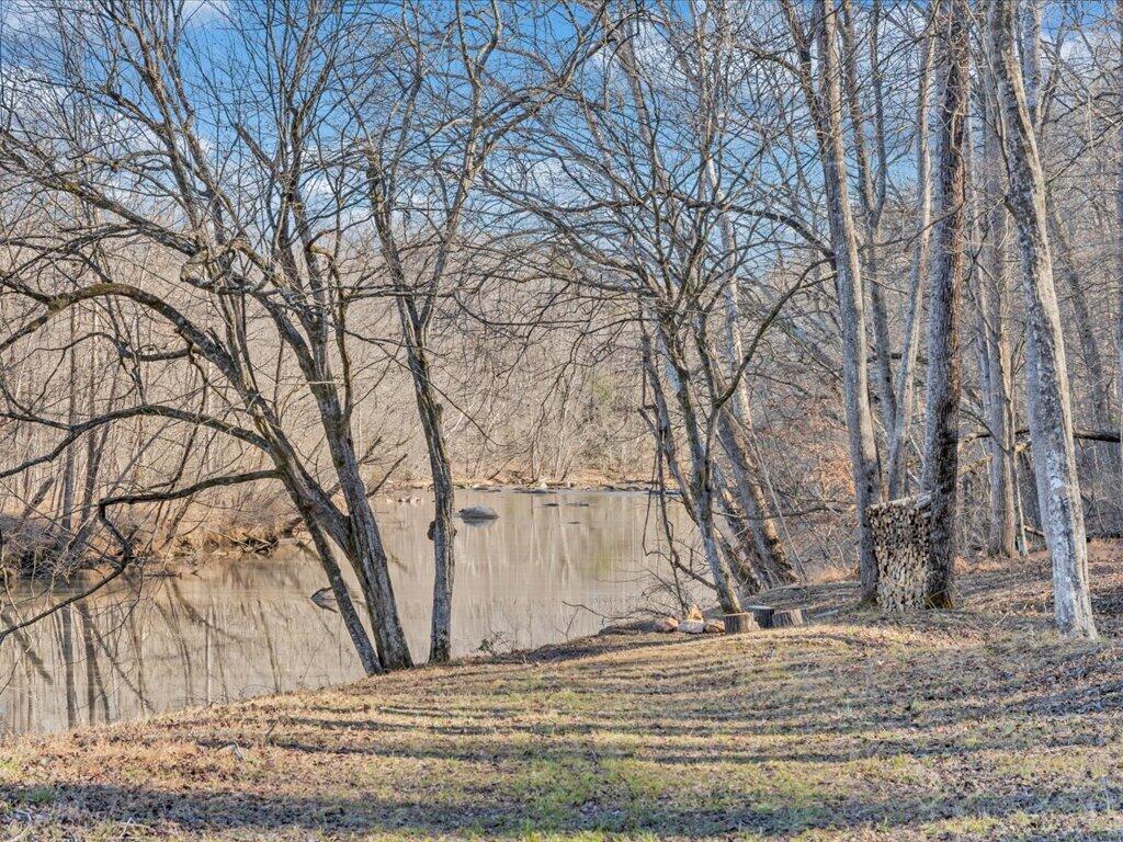 1511 Eggleston Falls Road Ridgeway, VA 24148 - Photo 73 of 151 a view of a yard covered with snow in the background