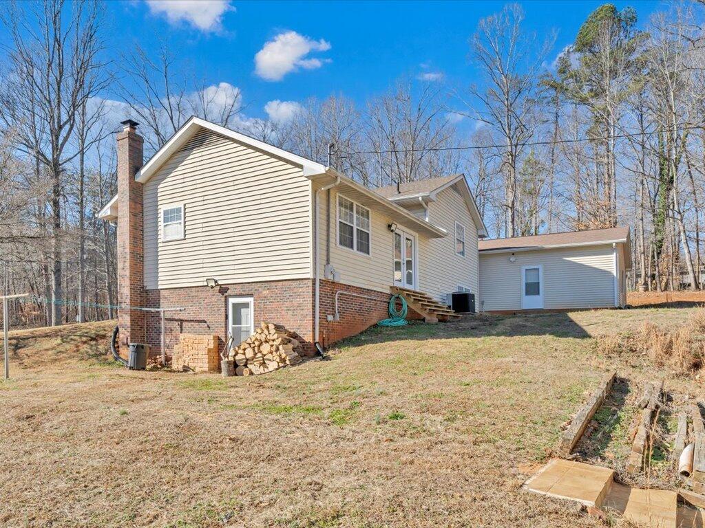 1511 Eggleston Falls Road Ridgeway, VA 24148 - Photo 95 of 151 a view of a house with snow on the roof