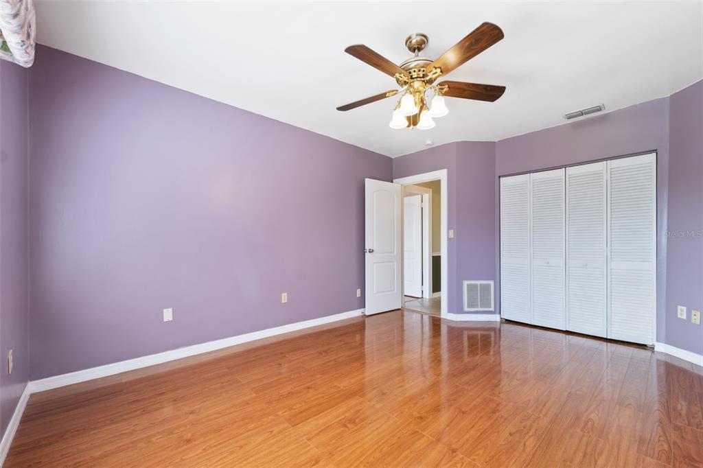 6225 Bayside Drive New Port Richey, FL 34652 - Photo 27 of 84 a view of an empty room with wooden floor