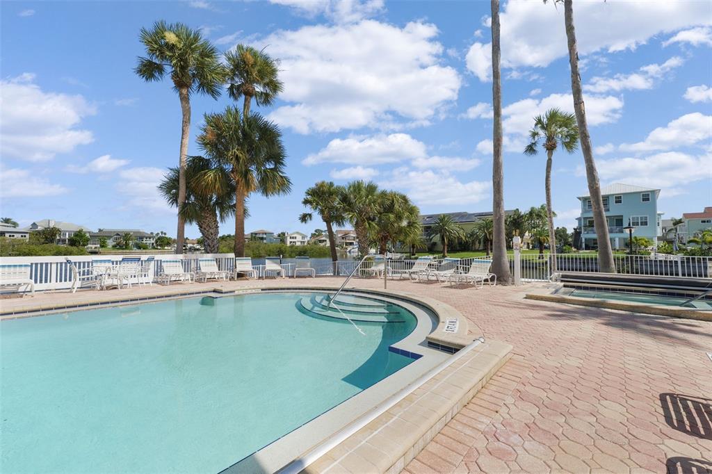 6225 Bayside Drive New Port Richey, FL 34652 - Photo 66 of 84 a view of a swimming pool and a terrace