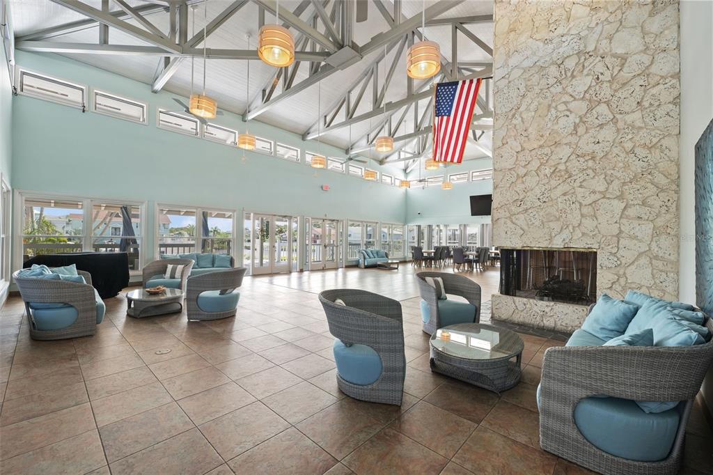 6225 Bayside Drive New Port Richey, FL 34652 - Photo 73 of 84 a living room with furniture and a fireplace