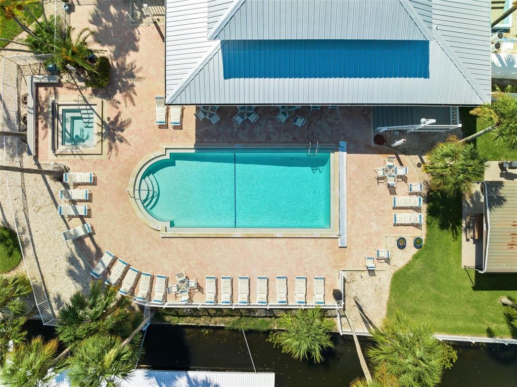 6225 Bayside Drive New Port Richey, FL 34652 - Photo 79 of 84 an aerial view of a house with swimming pool and patio