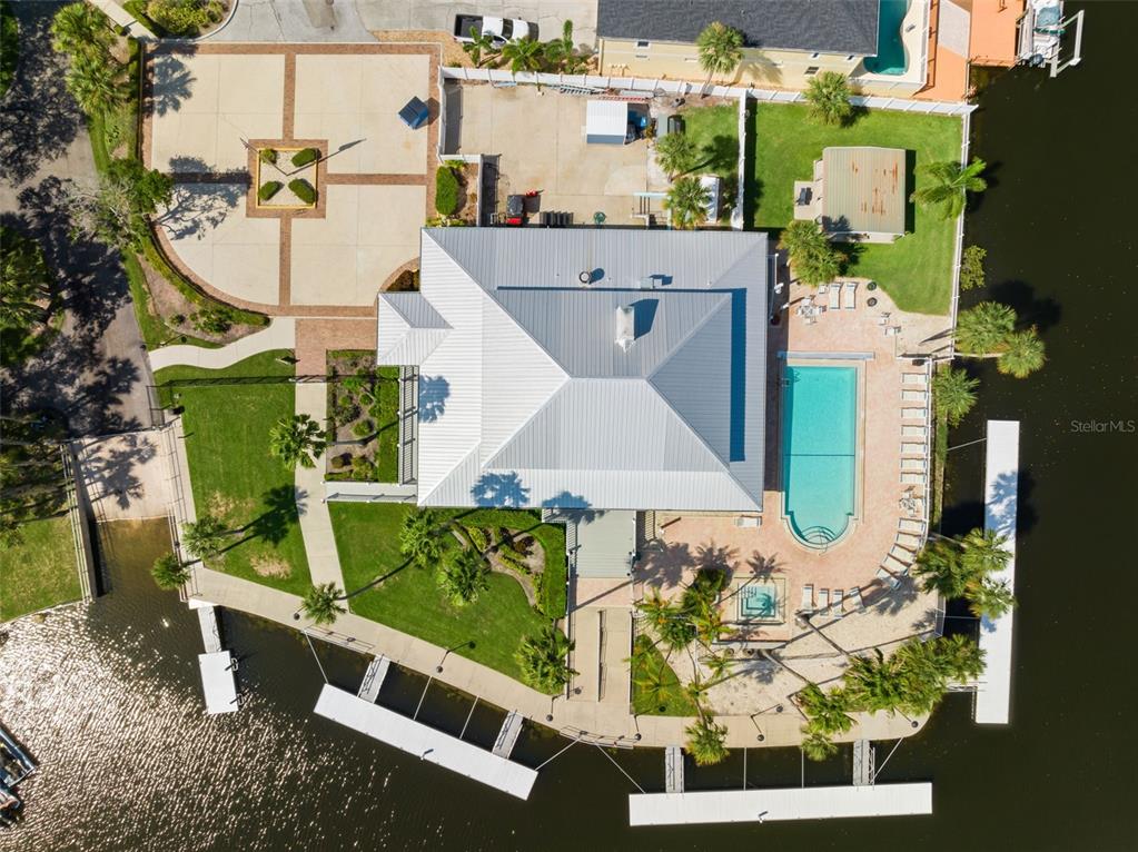 6225 Bayside Drive New Port Richey, FL 34652 - Photo 80 of 84 an aerial view of a house with a yard