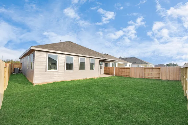 a house view with a garden space
