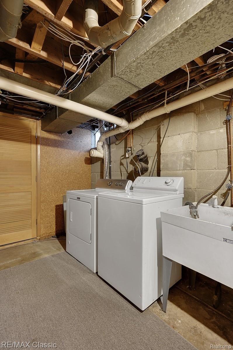1831 South Commerce Road Walled Lake, MI 48390 - Photo 20 of 23 Laundry and Utility Storage Room