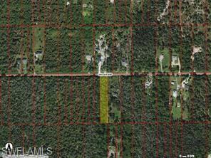 Undisclosed Address Naples, FL 34120 - Photo 2 of 3 a view of a yard