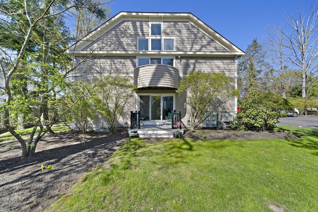 20 Jasper Lane, Unit 20 Randolph, MA 02368 - Photo 13 of 13 a front view of a house with a yard