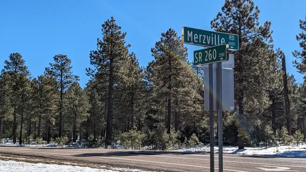 a sign that is on the side of a road