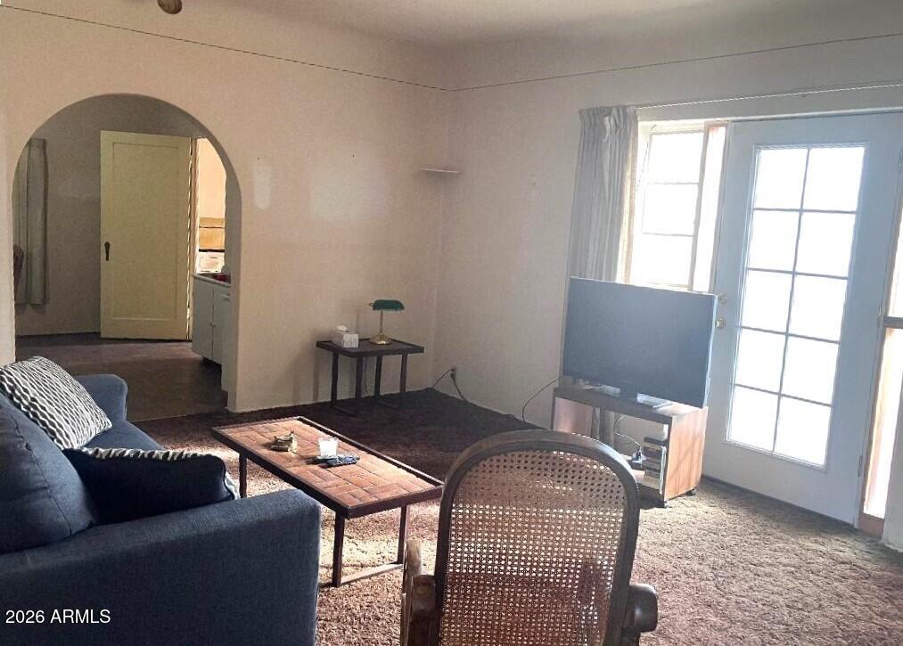 1637 East Roma Avenue Phoenix, AZ 85016 - Photo 11 of 78 a living room with furniture and a window