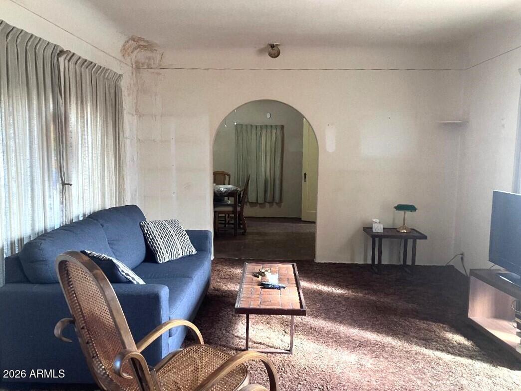 1637 East Roma Avenue Phoenix, AZ 85016 - Photo 12 of 78 a living room with furniture and a window