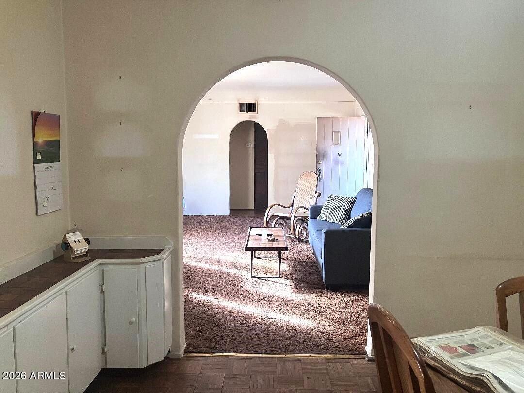 1637 East Roma Avenue Phoenix, AZ 85016 - Photo 16 of 78 a living room with furniture and a window